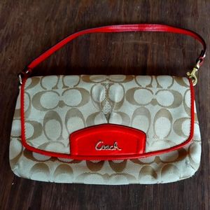 Coach pouch wristlet handbag - logo canvas with orange leather trim and strap